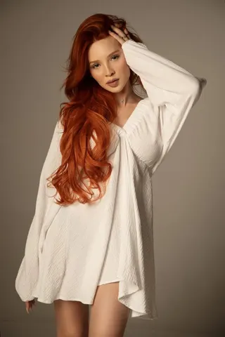 Incredibly attractive and slender red-haired escort model № 8